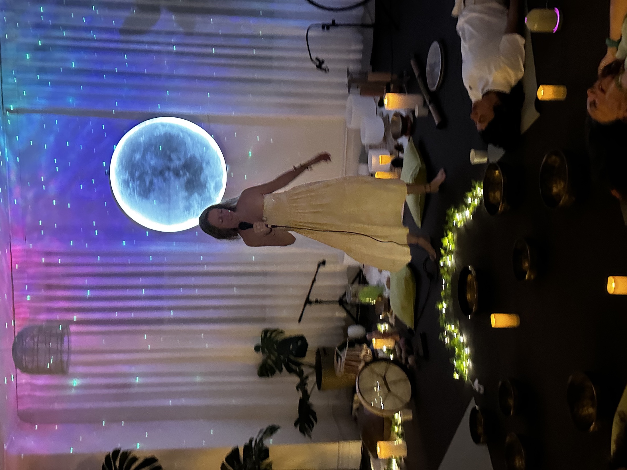 Giada Lovelight leading a live vocal and sound gathering at Mystic Wellness
